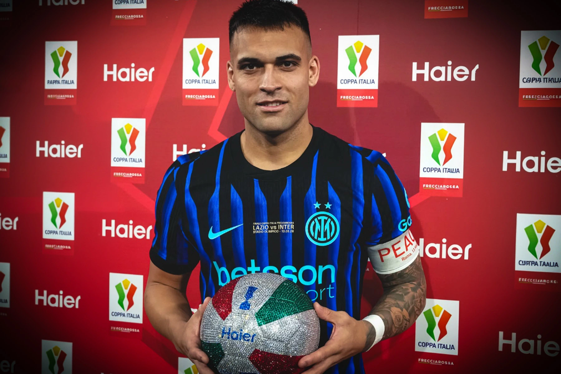 Lautaro Martinez with luxury football covered with Swarovski crystals, featuring Haier branding, Haier Cam logo and the the Coppa Italia.